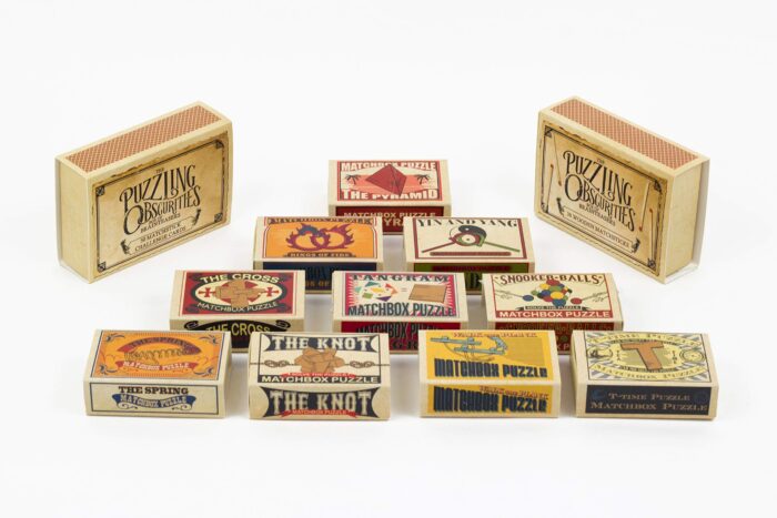 Professor Puzzle, Puzzling Obscurities Box of Brainteasers - 10 Unique Matchbox Puzzles & 50 Unique Brain Teasing Challenges